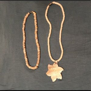 His and hers shell necklace set
